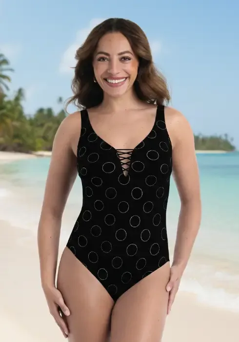 Rosa Faia Silver Pearls Nova Swimsuit. Sparkly silver dots in circles on a black background with a lace up front