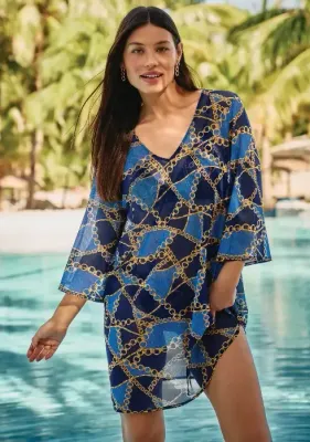 Lifestyle photo Sea Chains Hawaii Beach Dress. The fabric is a inked chains on a navy blue background design