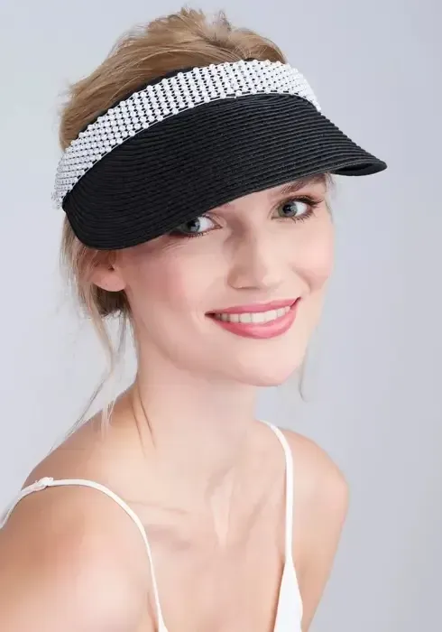 Lifestyle photo of Lorena Visor in Black with sparkling metallic band.