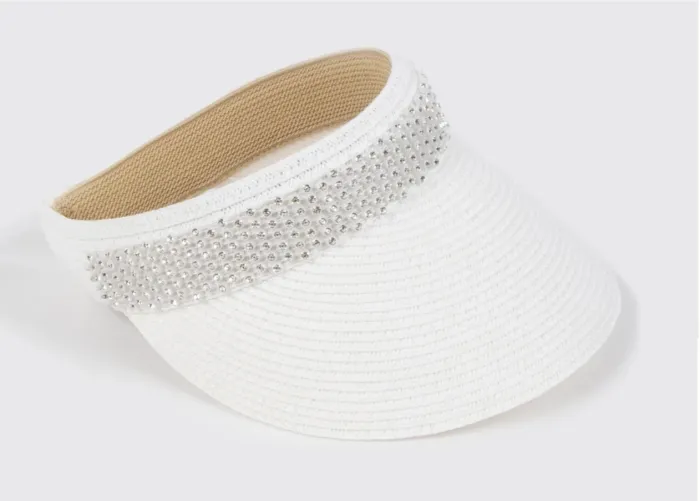 Lifestyle photo of Lorena Visor in White with sparkling metallic band.