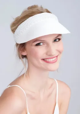 Lifestyle photo of Lorena Visor in White with sparkling metallic band.