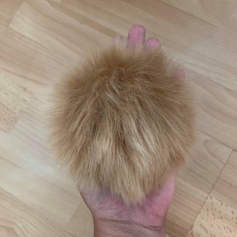 Pompon fausse fourrure de raton laveur brun pâle