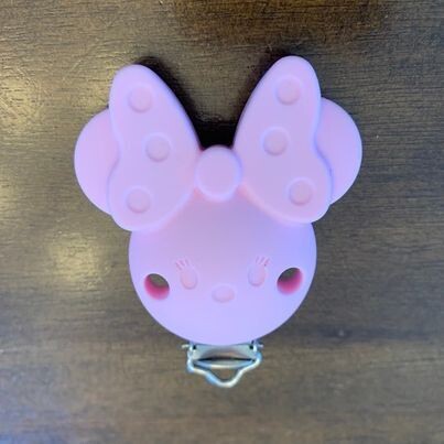 Attache suce Minnie, couleur: rose pâle