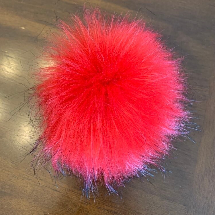 Pompon fausse fourrure de raton laveur rouge