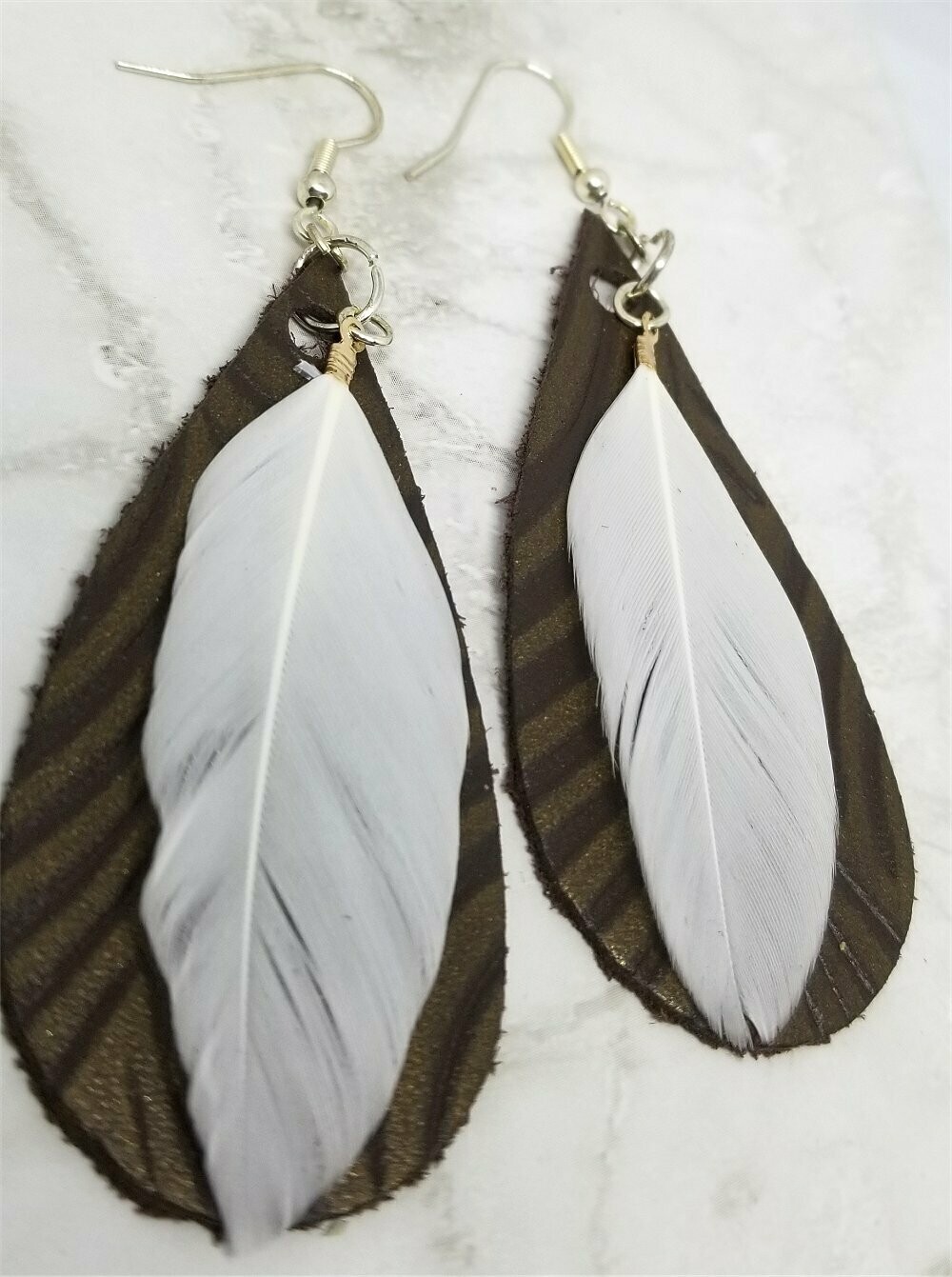 Brown Embossed Teardrop Shaped Leather Earrings with White Feather Overlay