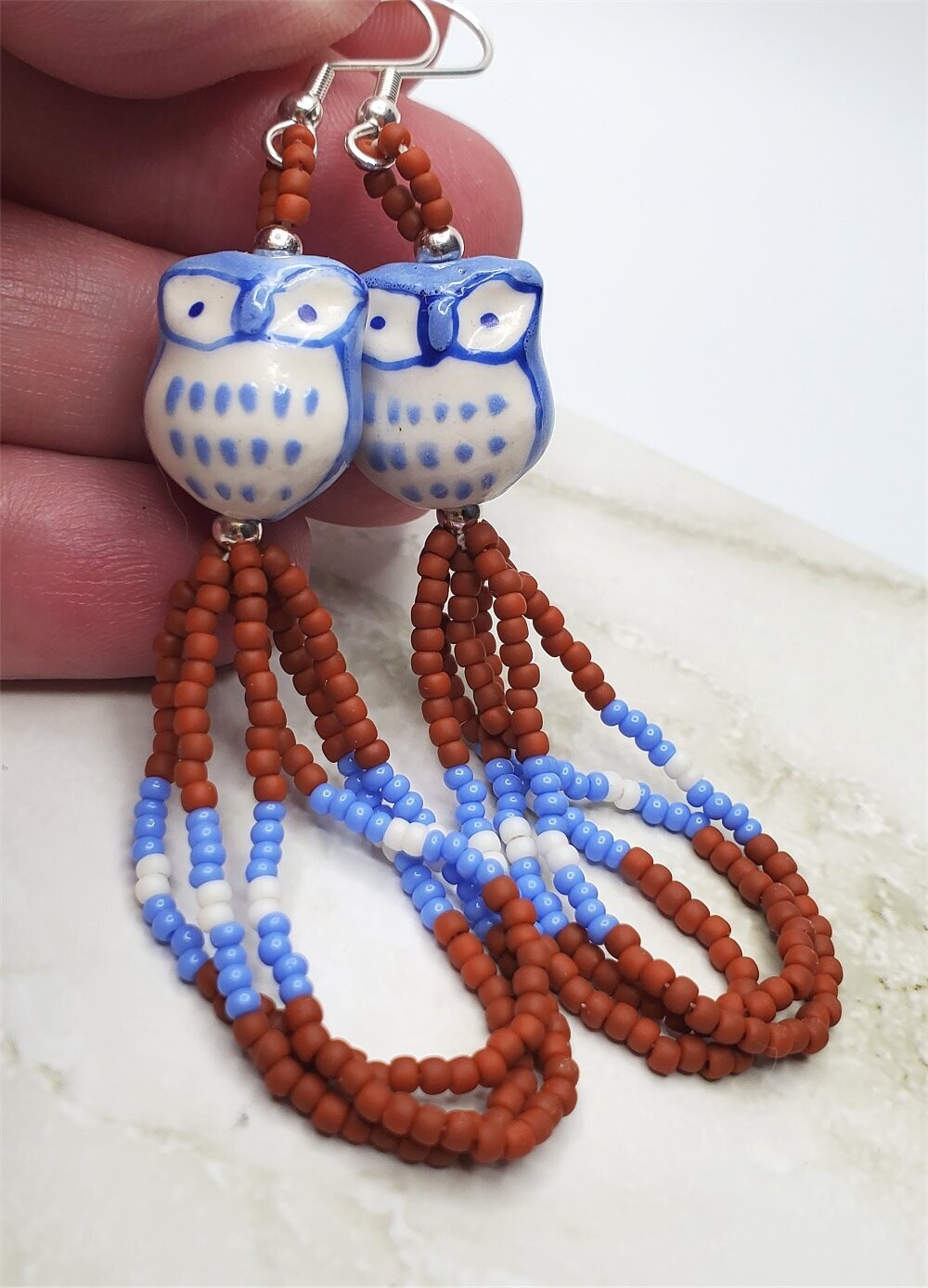 Blue and White Glass Owl Earrings with Terracotta, Periwinkle, and White Seed Beads