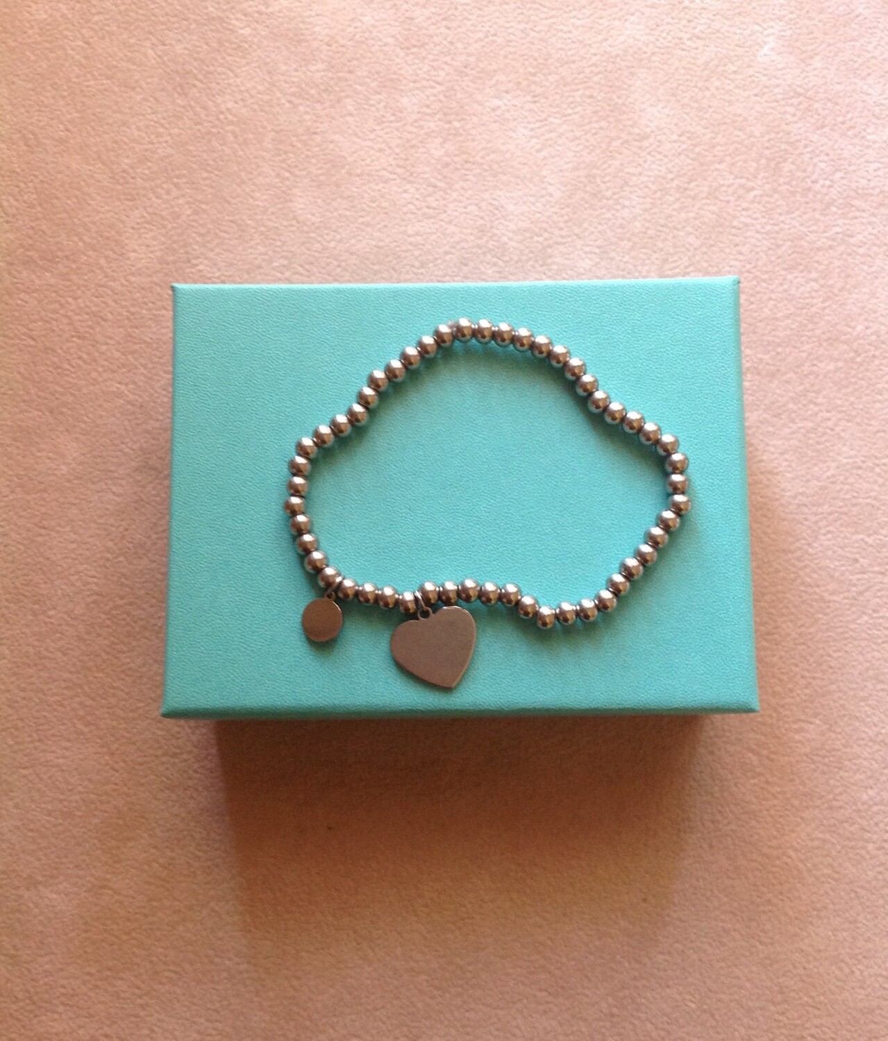 Bracciale sfere cuore e medaglietta