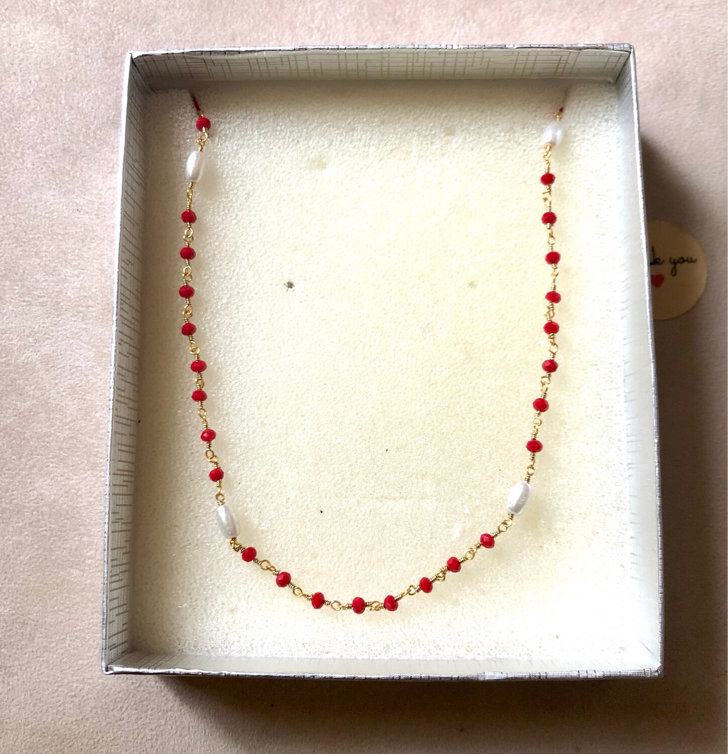 Collana red whith pearls