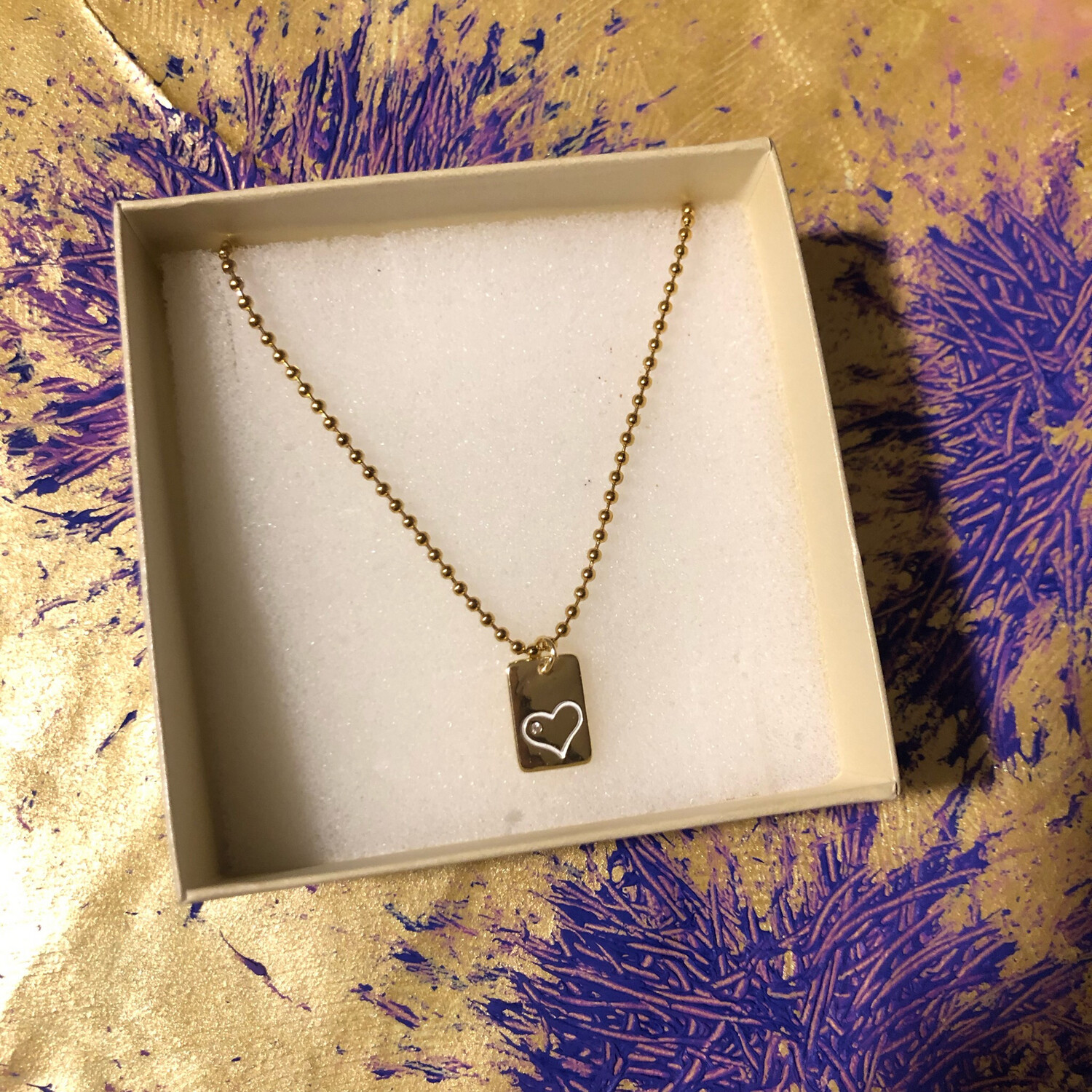 Collana charme rettangolare cuore e punto luce