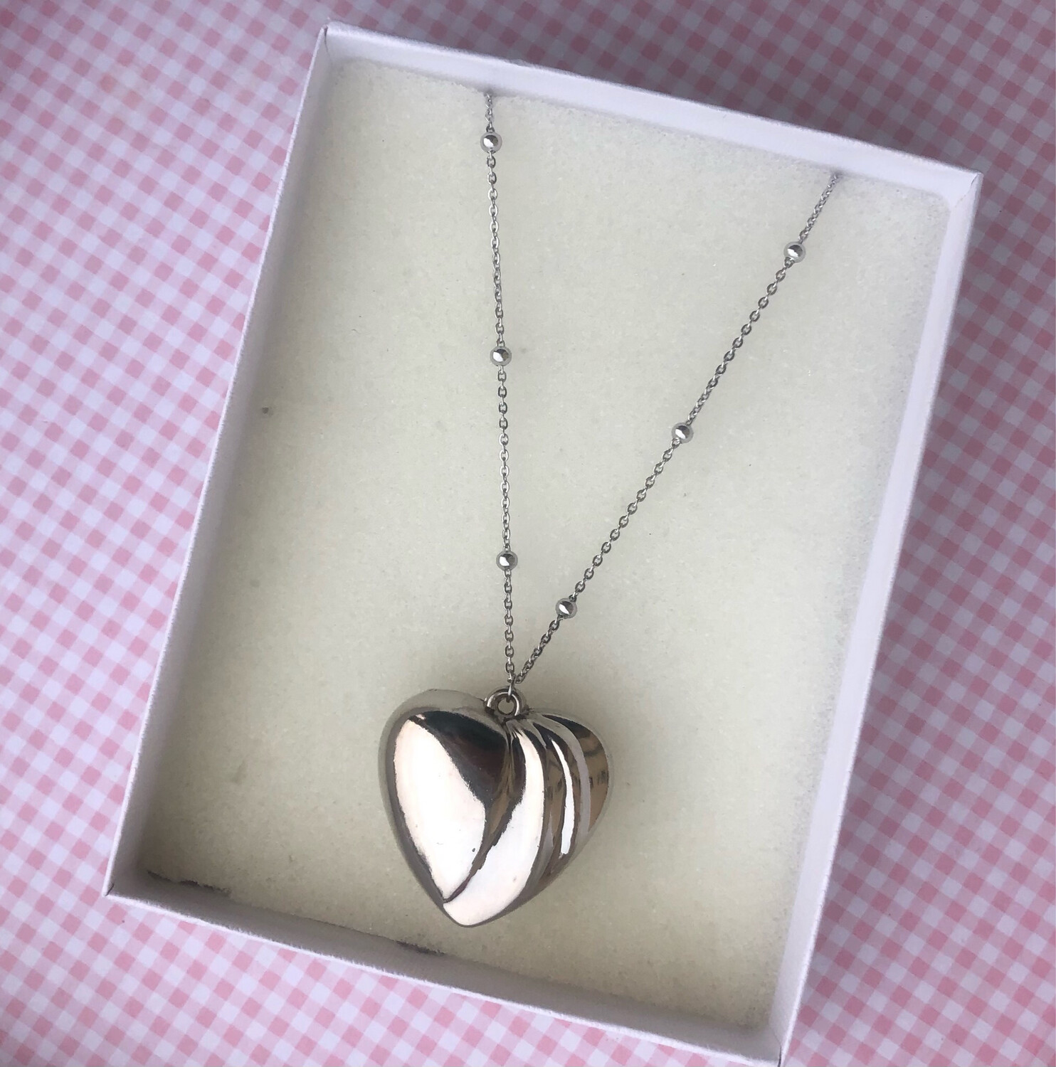 Collana cuore bombato onde