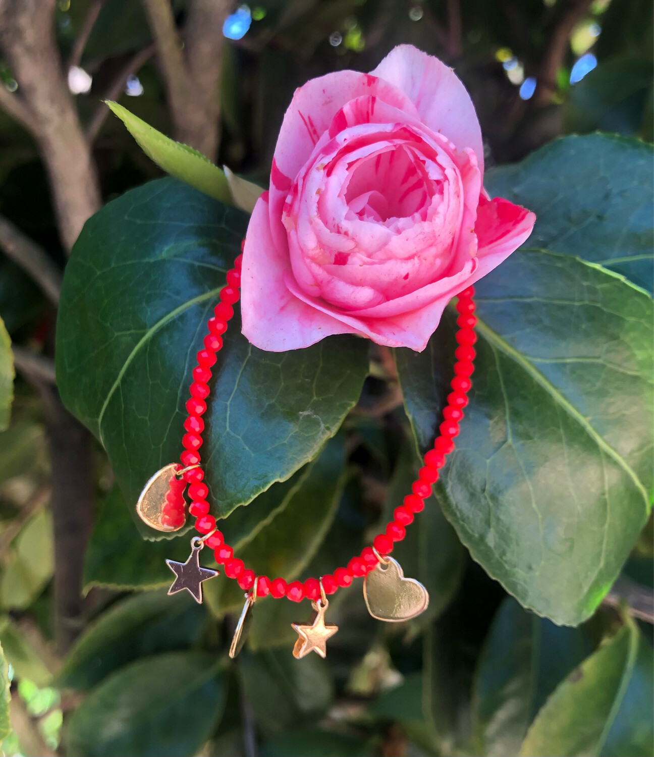 Bracciale rosso cuori e stelle