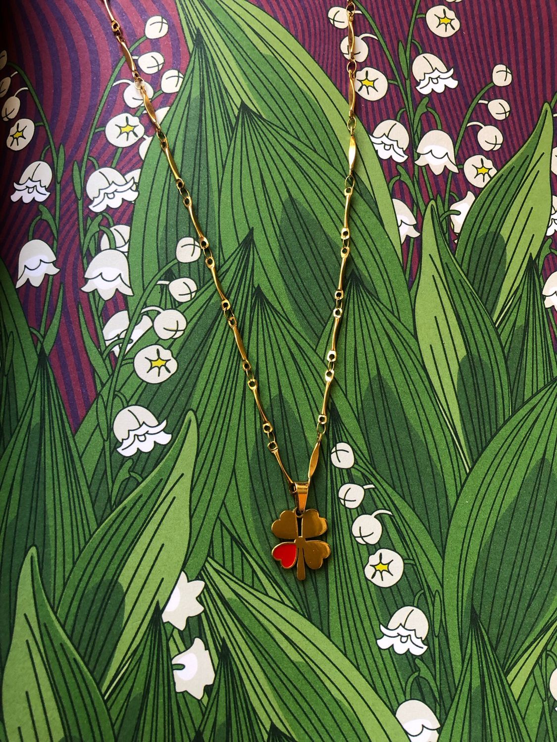 Collana quadrifoglio con cuoricino rosso