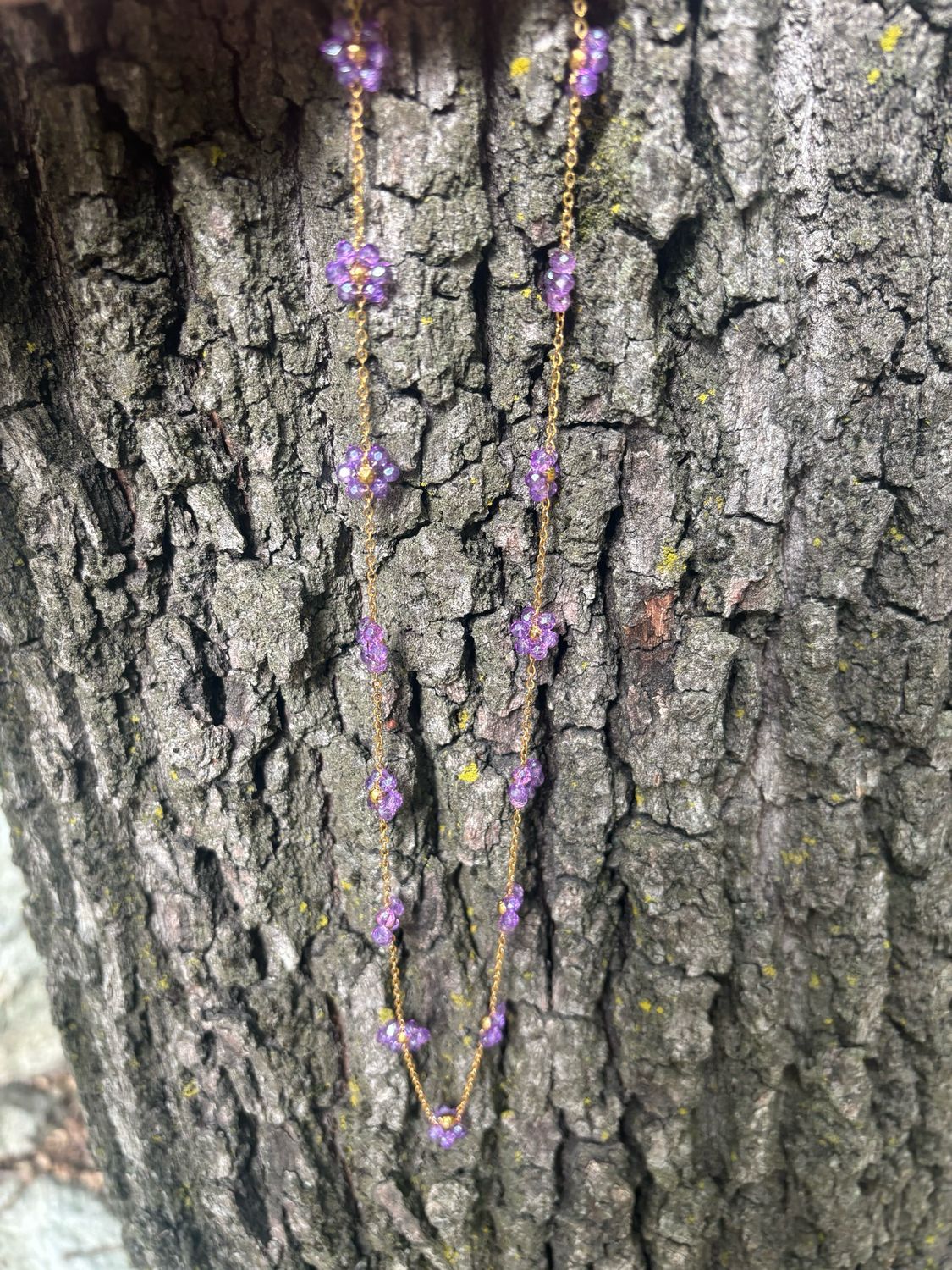 Collana margherite viola