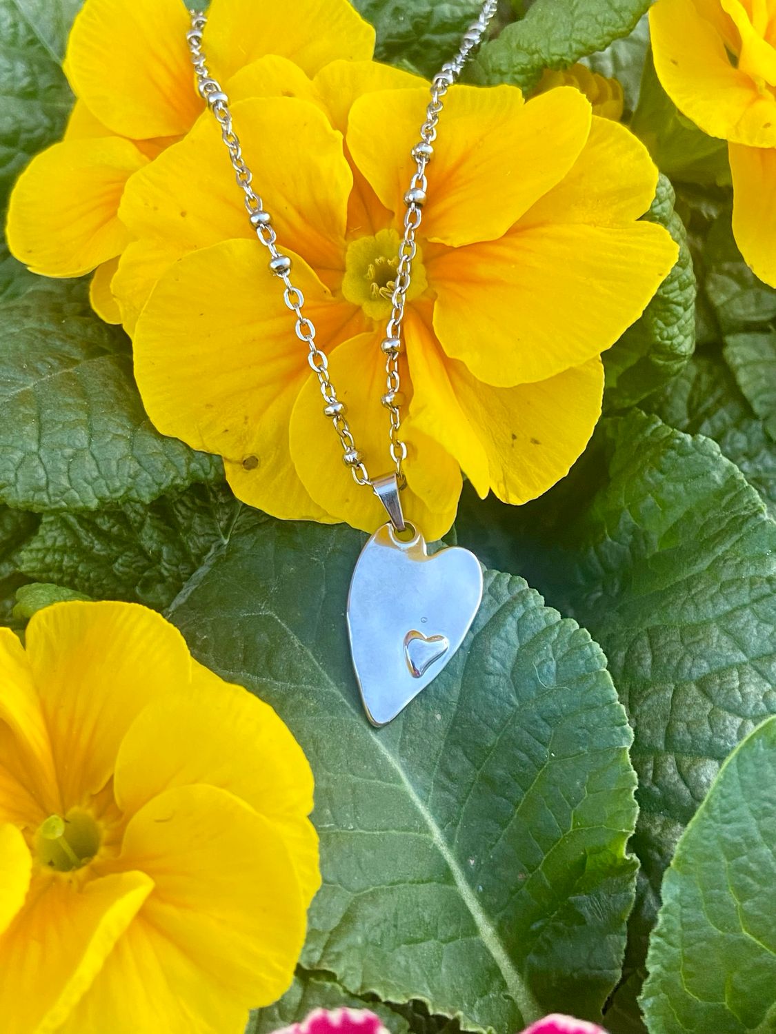 Collana cuore allungato con cuoricino