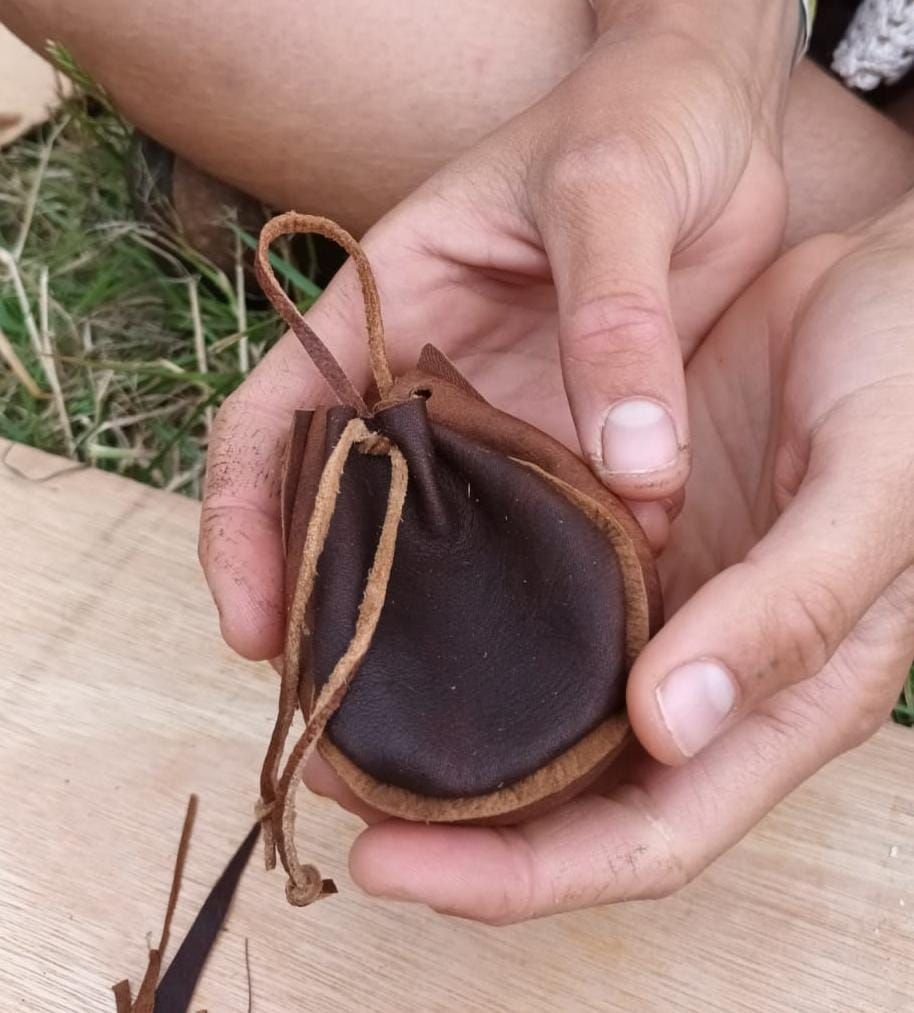 Sewing bark tanned leather pouches 19th Sept, 10-1