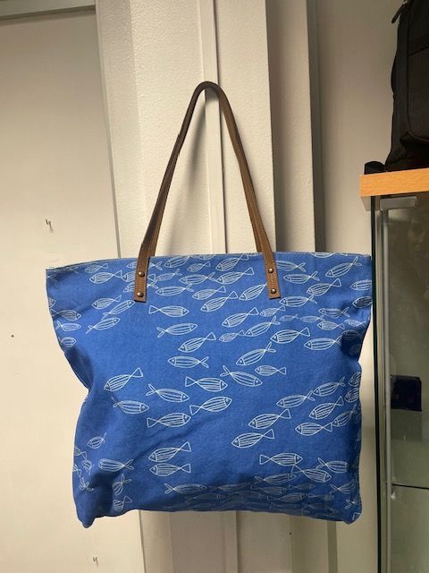 Bolso azul peces