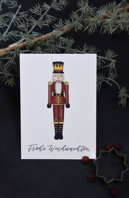 Postkarte Nussknacker “Frohe Weihnachten”, von Frollein Lücke Postkarte Nussknacker “Frohe Weihnachten”, von Frollein Lücke