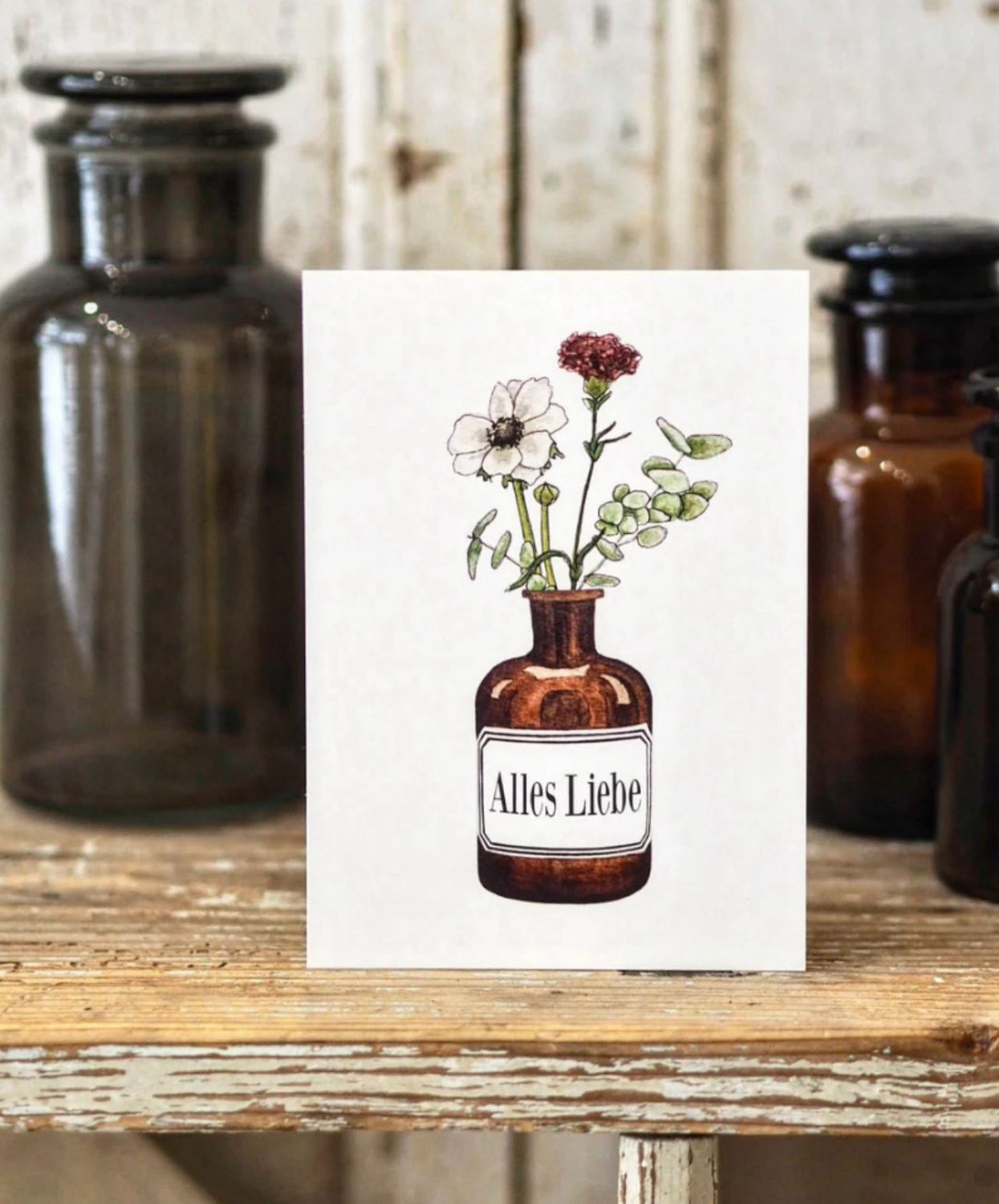 Postkarte „Alles Liebe“ Geburtstagsblumen in der Apothekerflasche