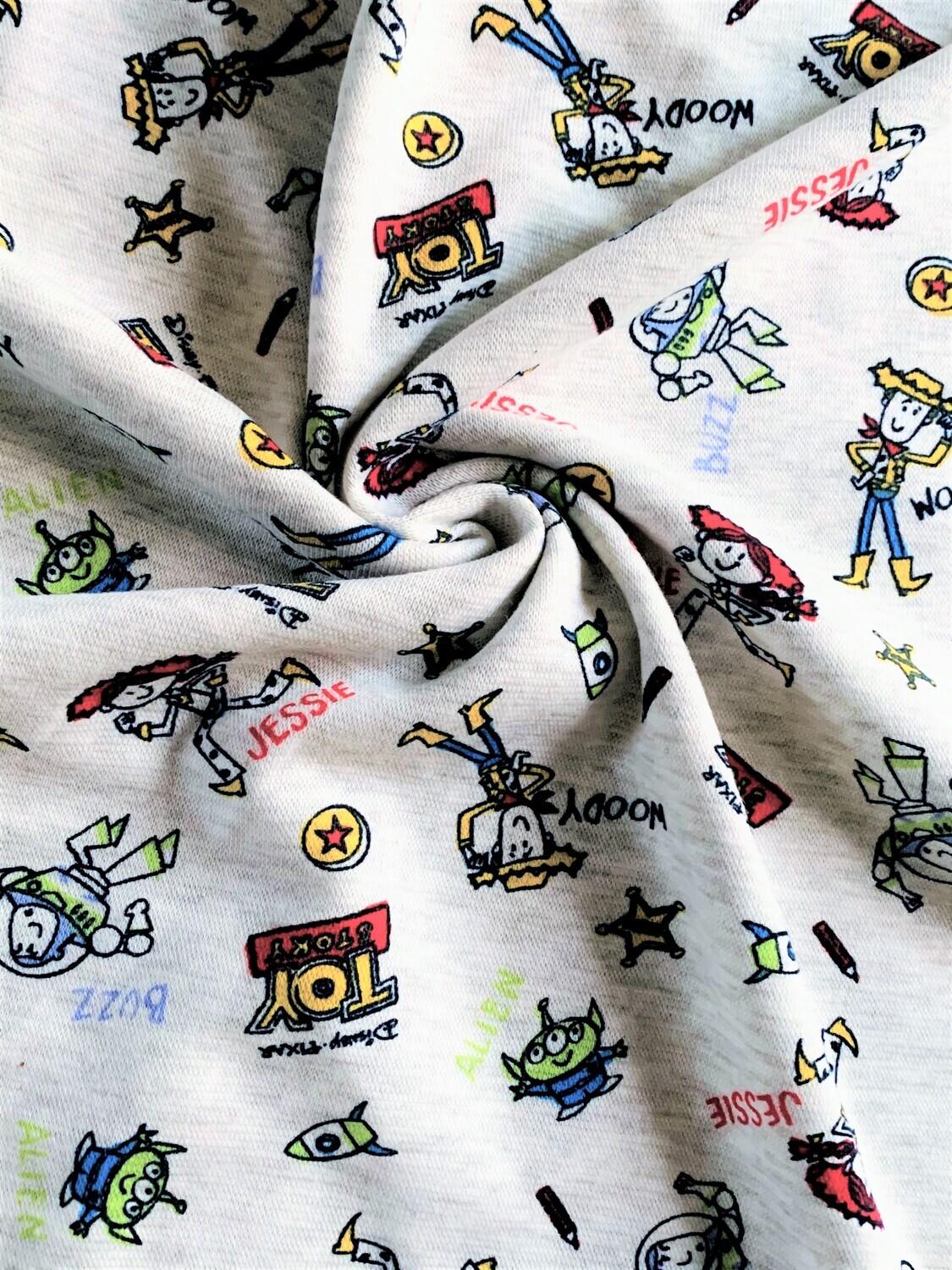 Toy Story Toss | Licensed Mini-Rib Cotton Lycra, 200gsm | 190cm Wide