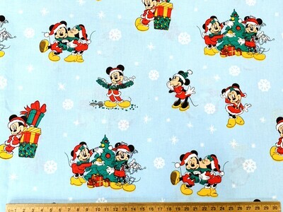 Mickey &amp; Minnie's Christmas | Licensed Quilting Cotton | 112cm wide