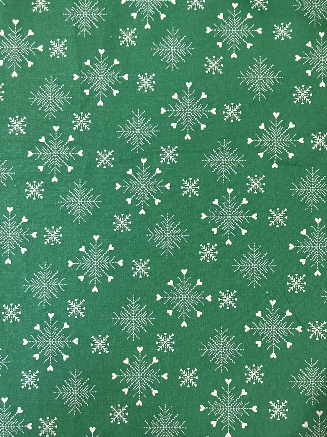 Snowflakes on Green | Quilting Cotton | 112cm Wide - 0.95m Piece