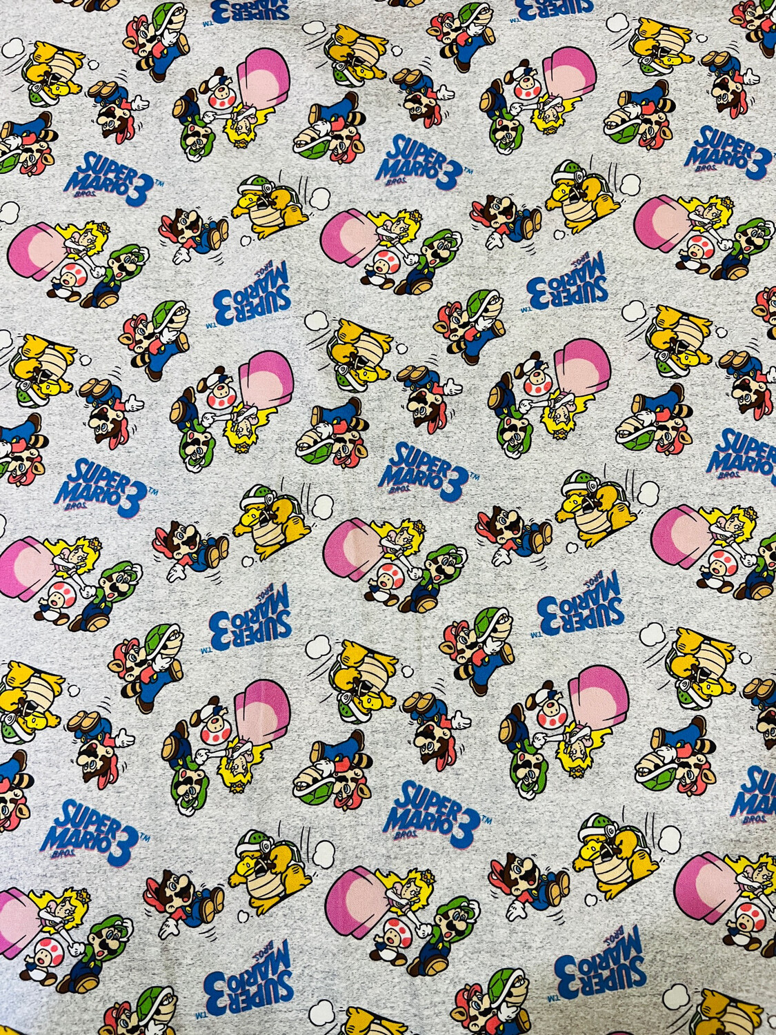 Mario Toss Grey | Licensed Quilting Cotton | 112cm wide