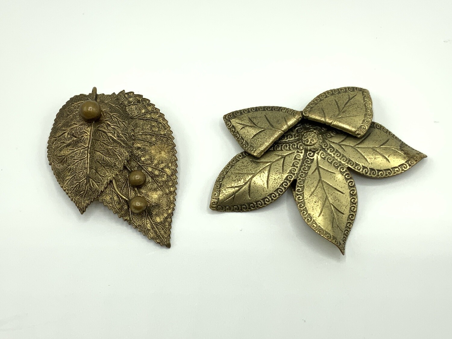 Two 1930's Metal Dress Clips