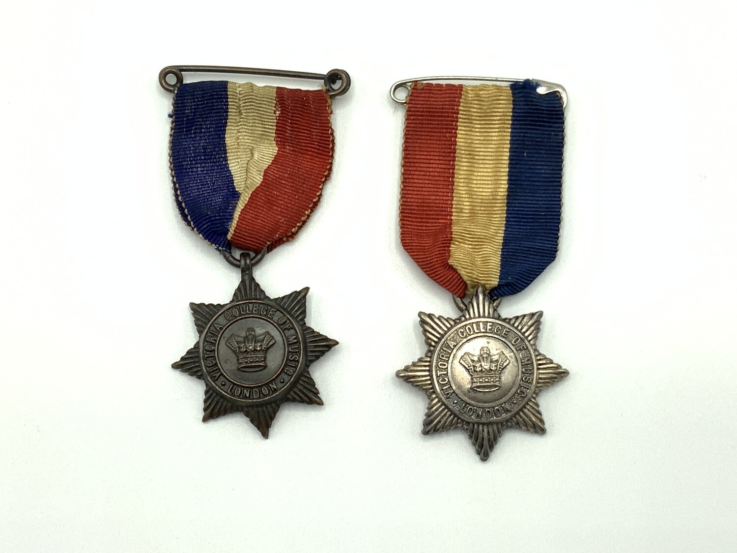 2 Antique Merit Medals from Victoria College of Music London