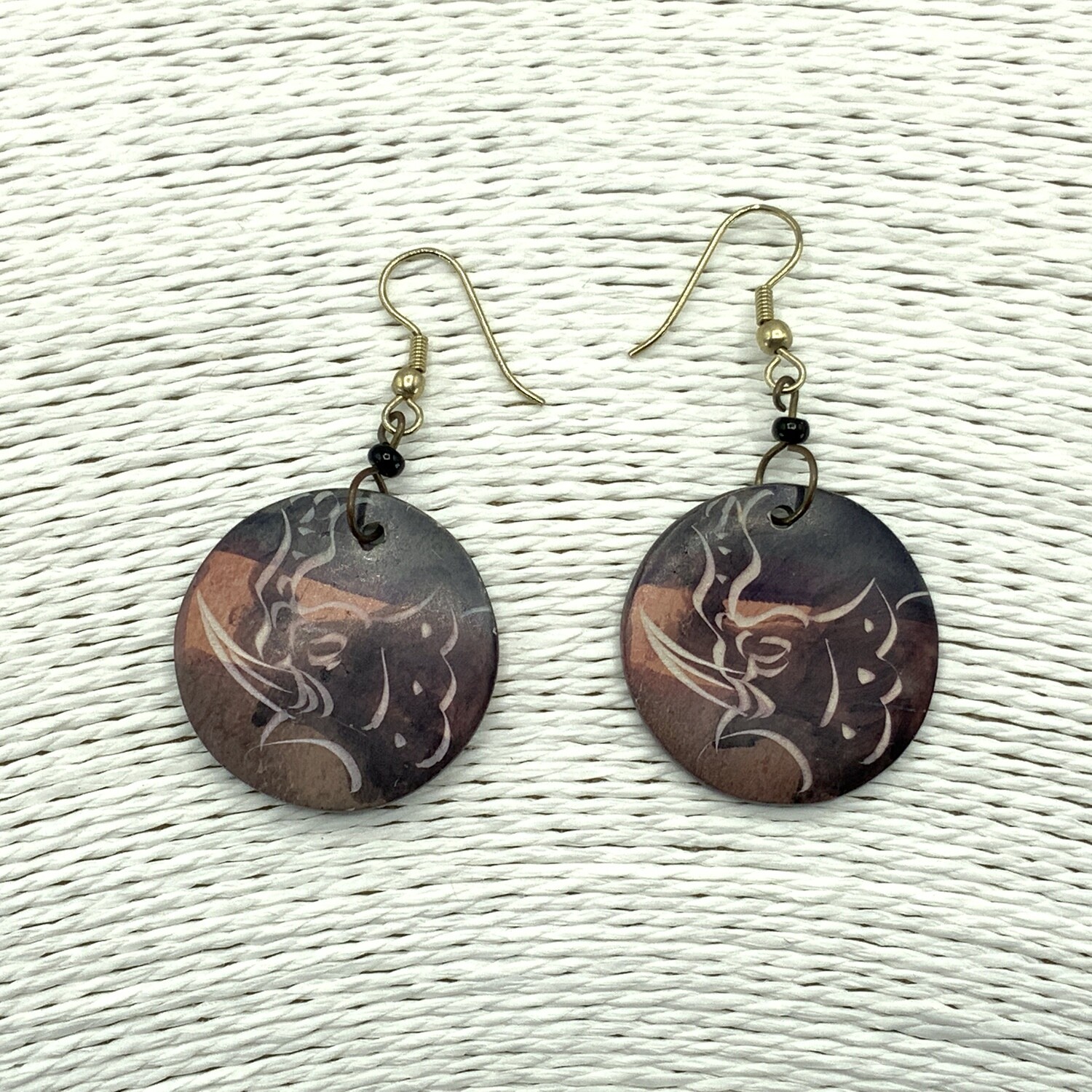 Artisan Handmade Shell Earrings. Elephant.