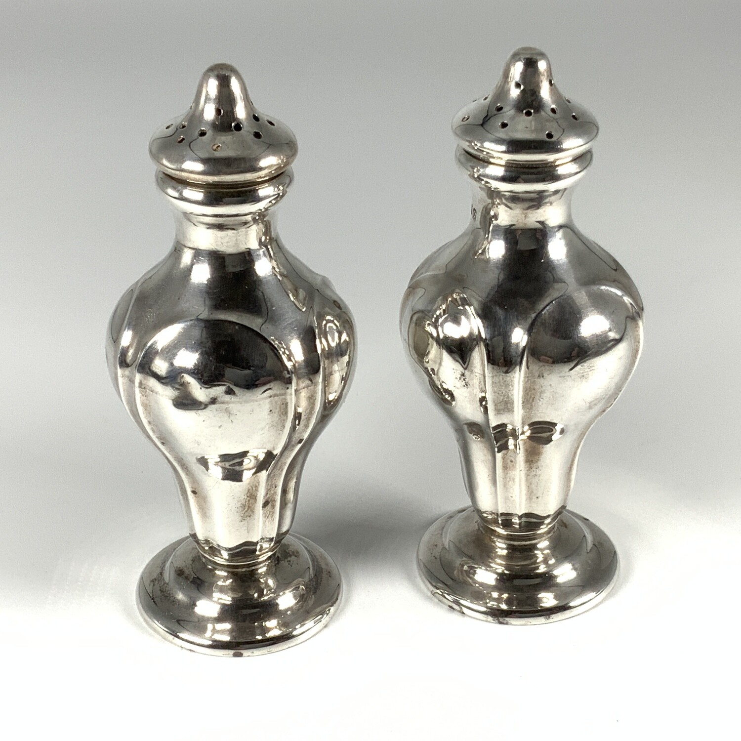 A Pair of Edwardian Antique Silver Pepperettes