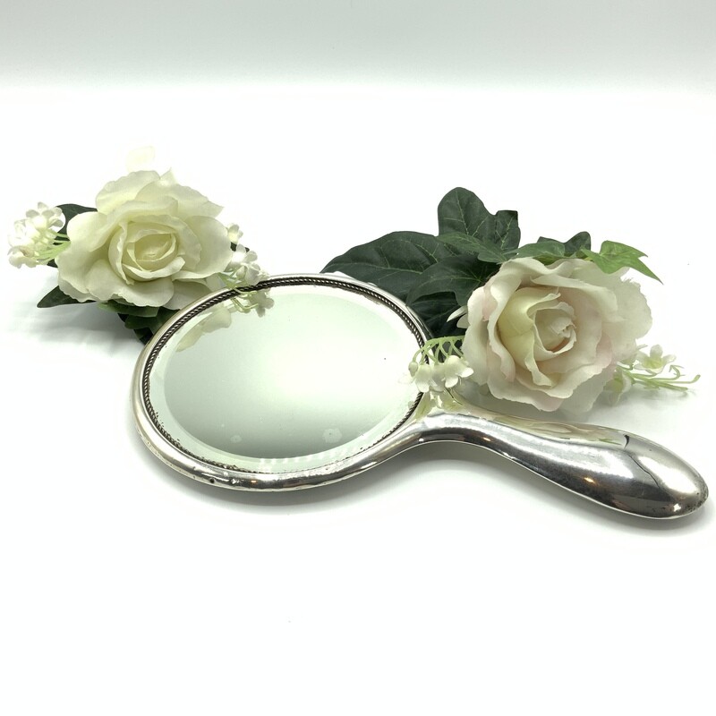 Antique Sterling Silver Hand mirror.