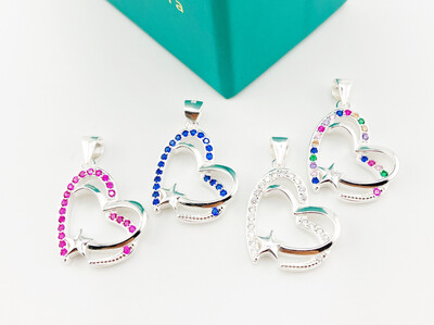 Dije de corazón con zirconia y estrella