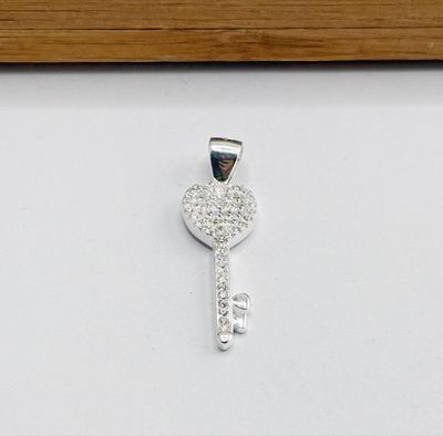 Dije llave con corazon