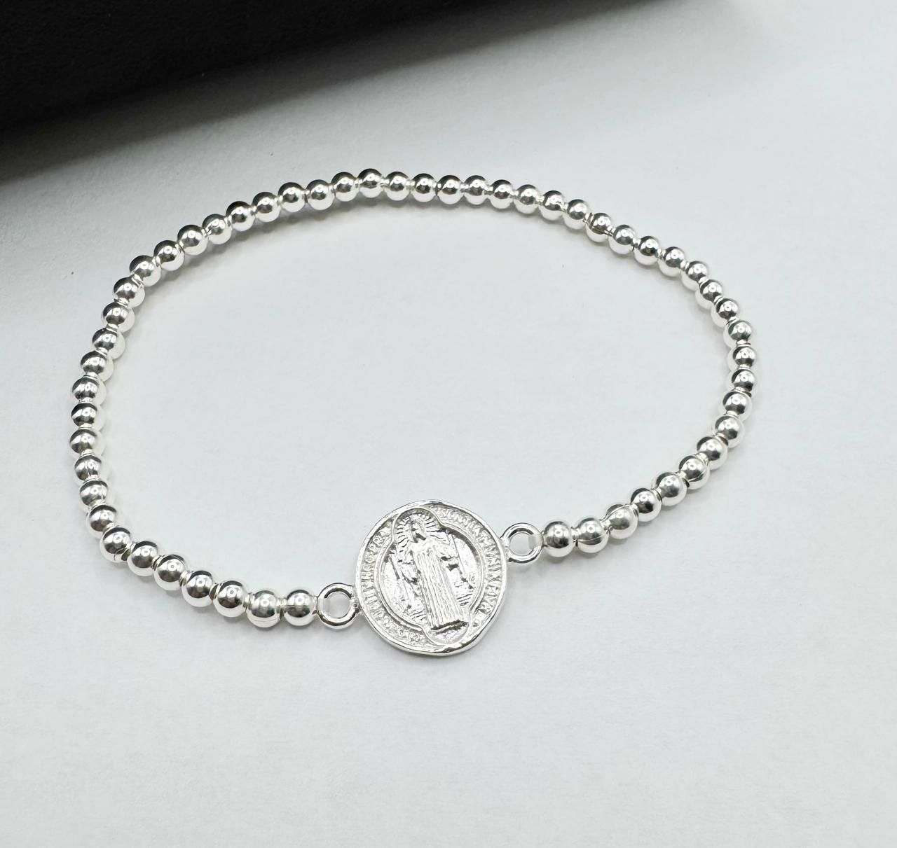 Pulsera religiosa