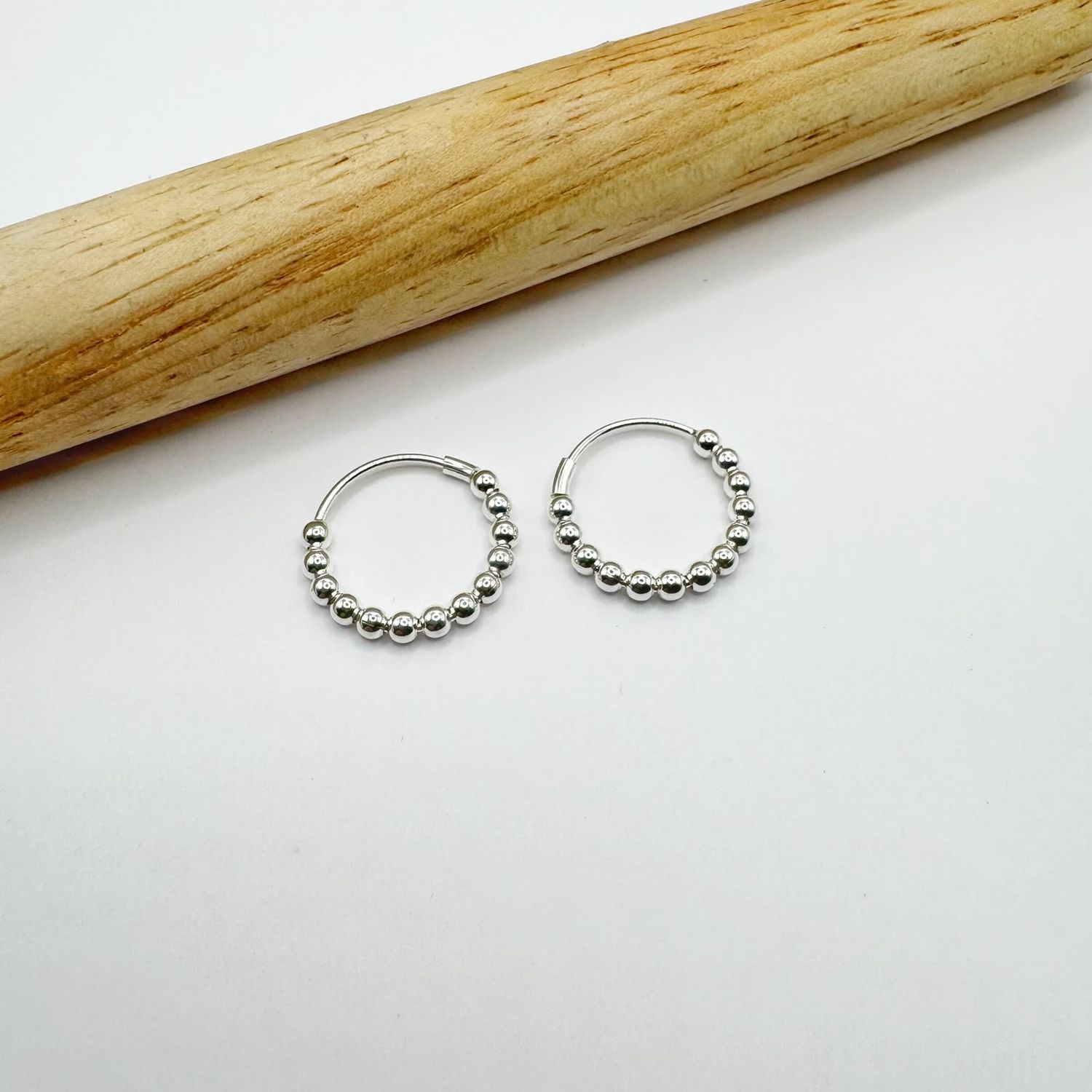 Argollas con bolitas