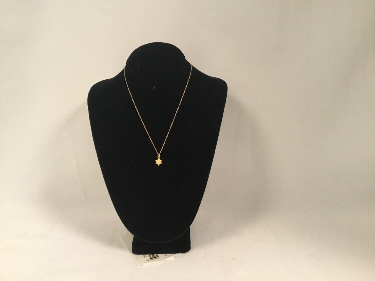 Tiny  14 Karat  Gold Star Necklace on  16&quot;Chain 