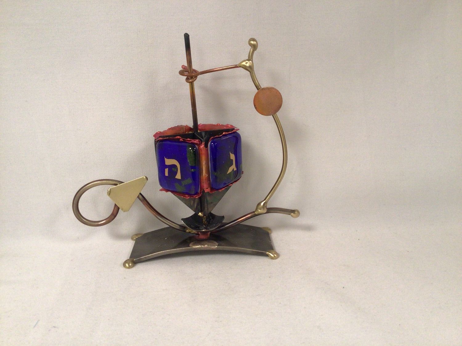 Small Elegant Dreidel in Blues on Curved Base