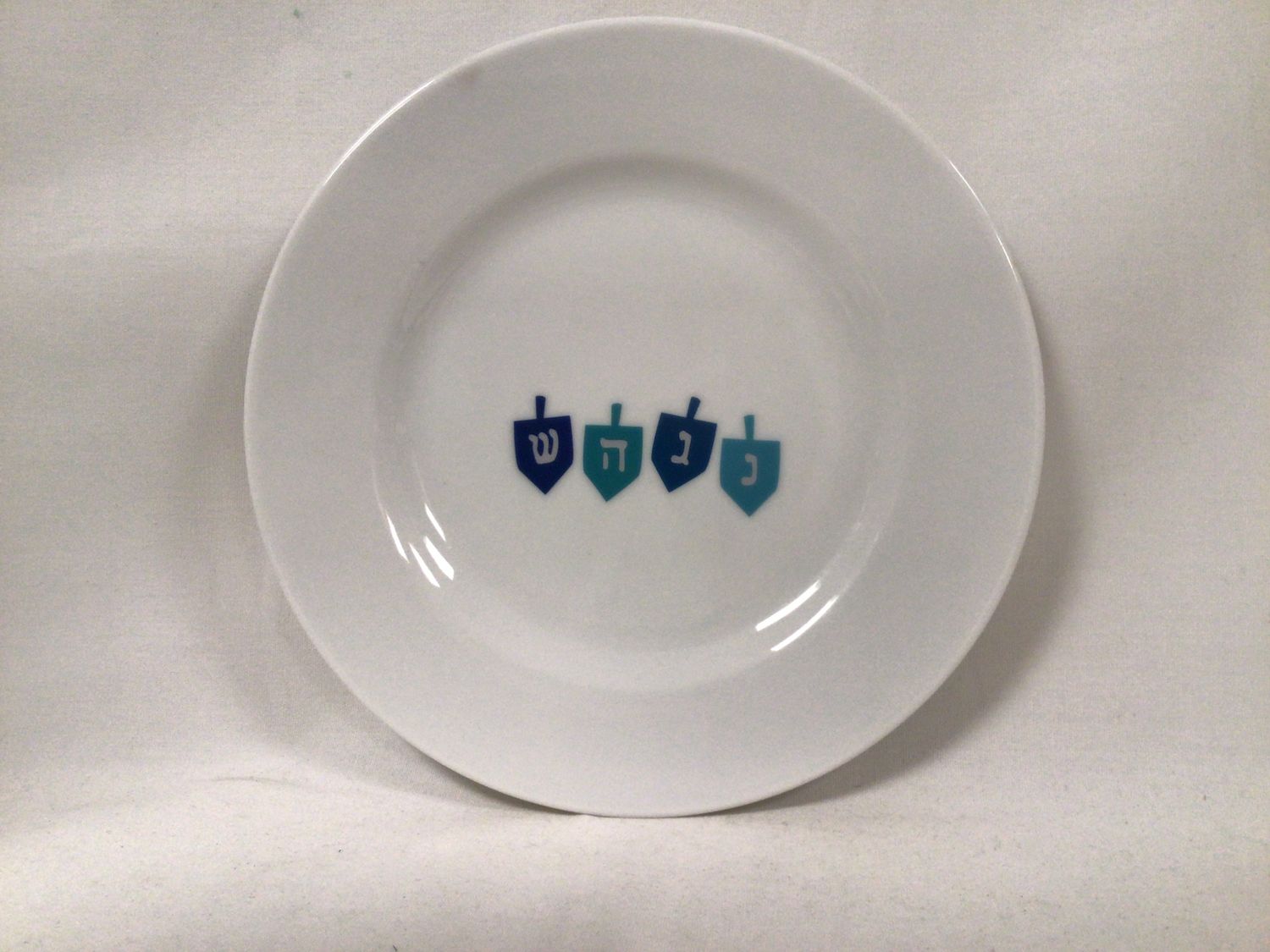 White Ceramic Hanukkah Plate with Dreidel Design