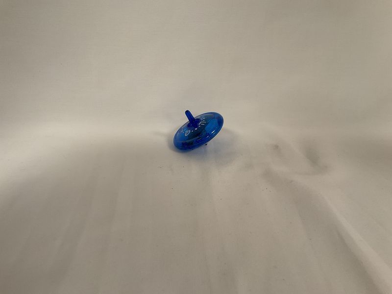 Blue and Silver Light Patterns on &quot;Light Up&quot; Dreidel Toy