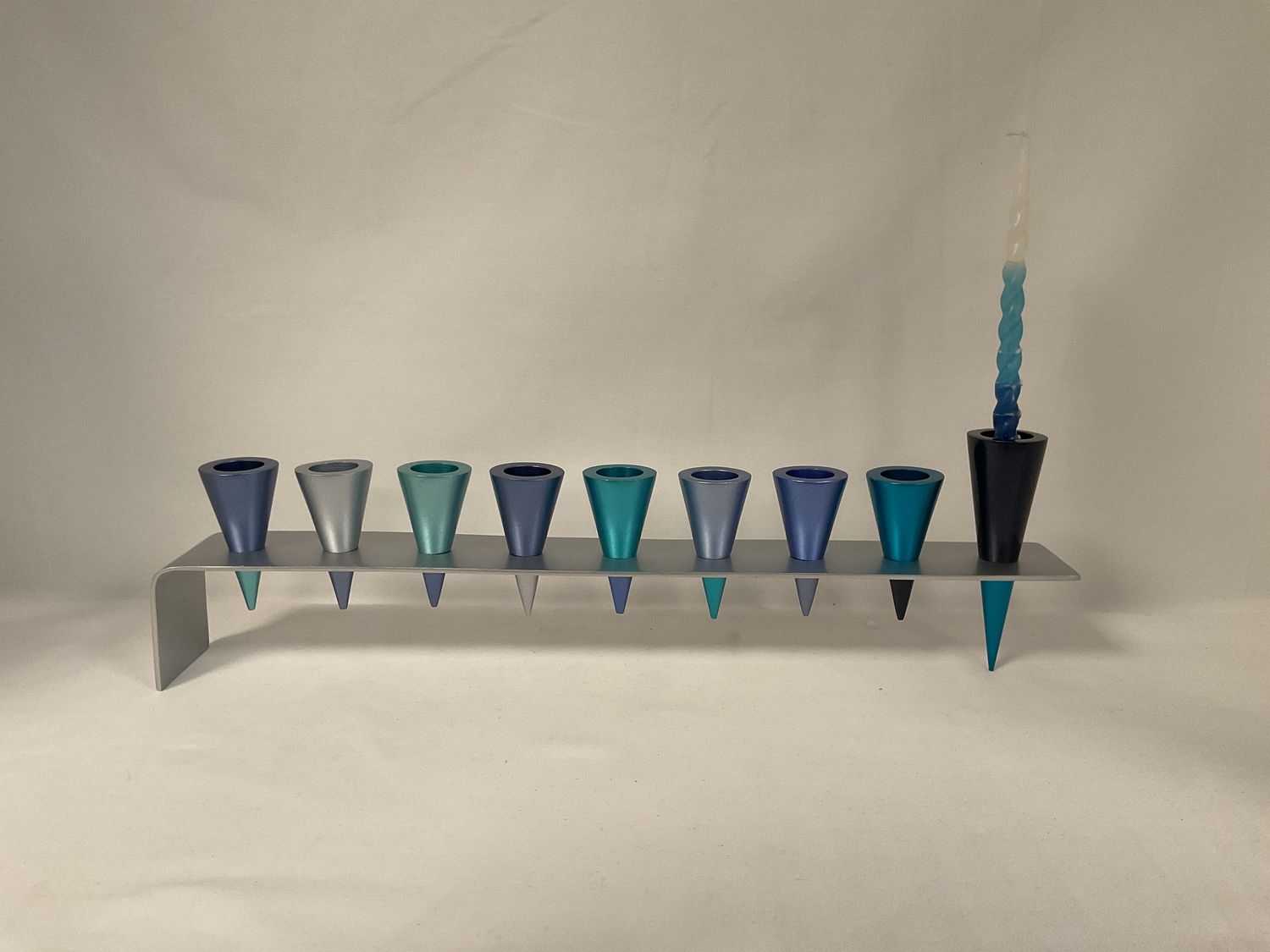 Metal Strip Menorah with Cone Shape Candle Holders in Blues Metal Strip Menorah with Cone Shape Candle Holders in Blues