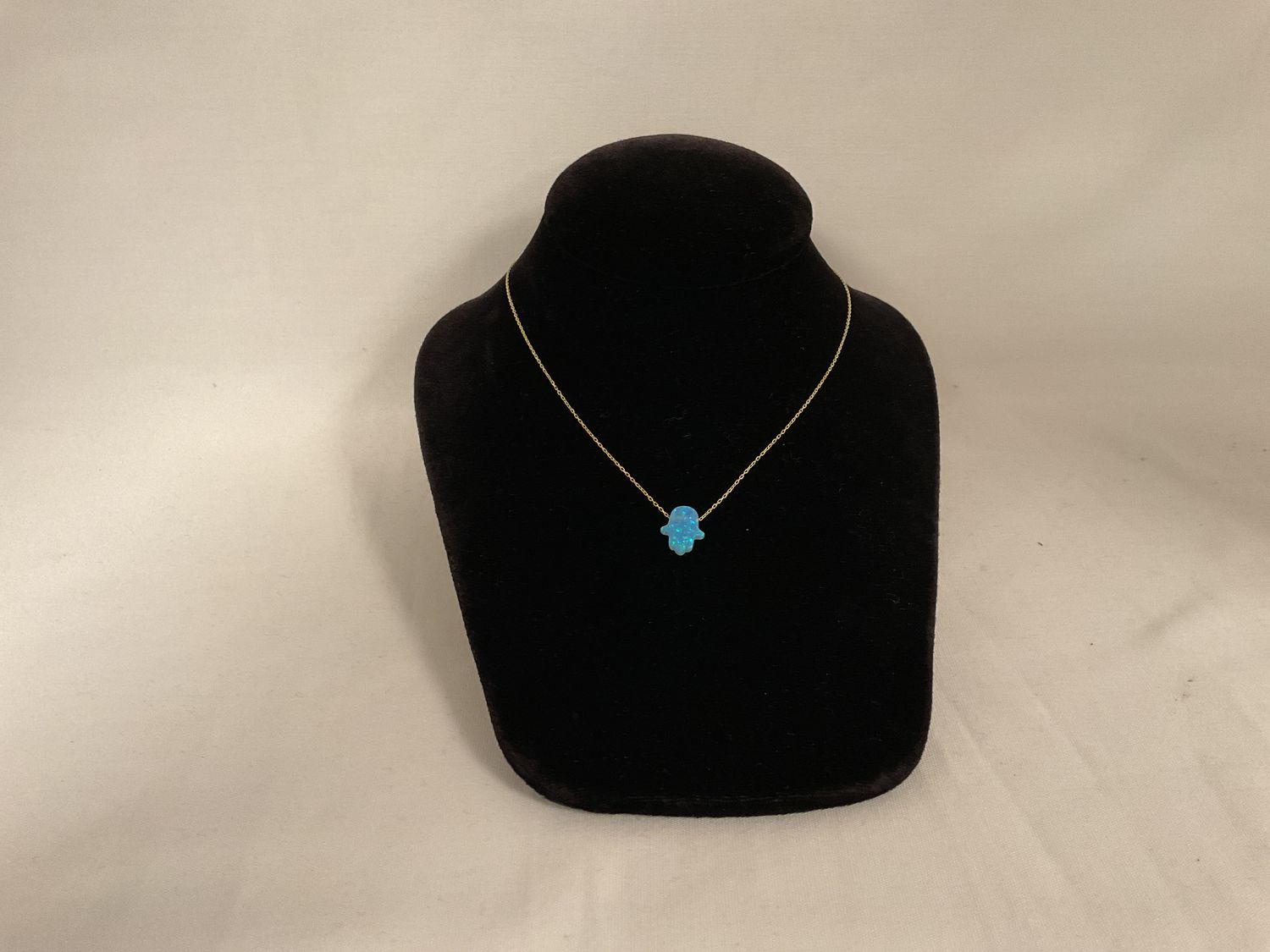 Blue, large Opal Hamsa Necklace on gold chain Blue, large Opal Hamsa Necklace on gold chain