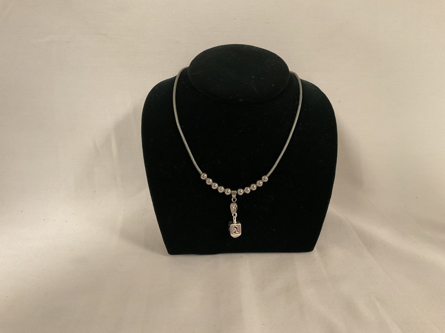 Handmade Silver Beaded Dreidel Necklace on Metallic Silver Leather Cord Handmade Silver Beaded Dreidel Necklace on Metallic Silver Leather Cord