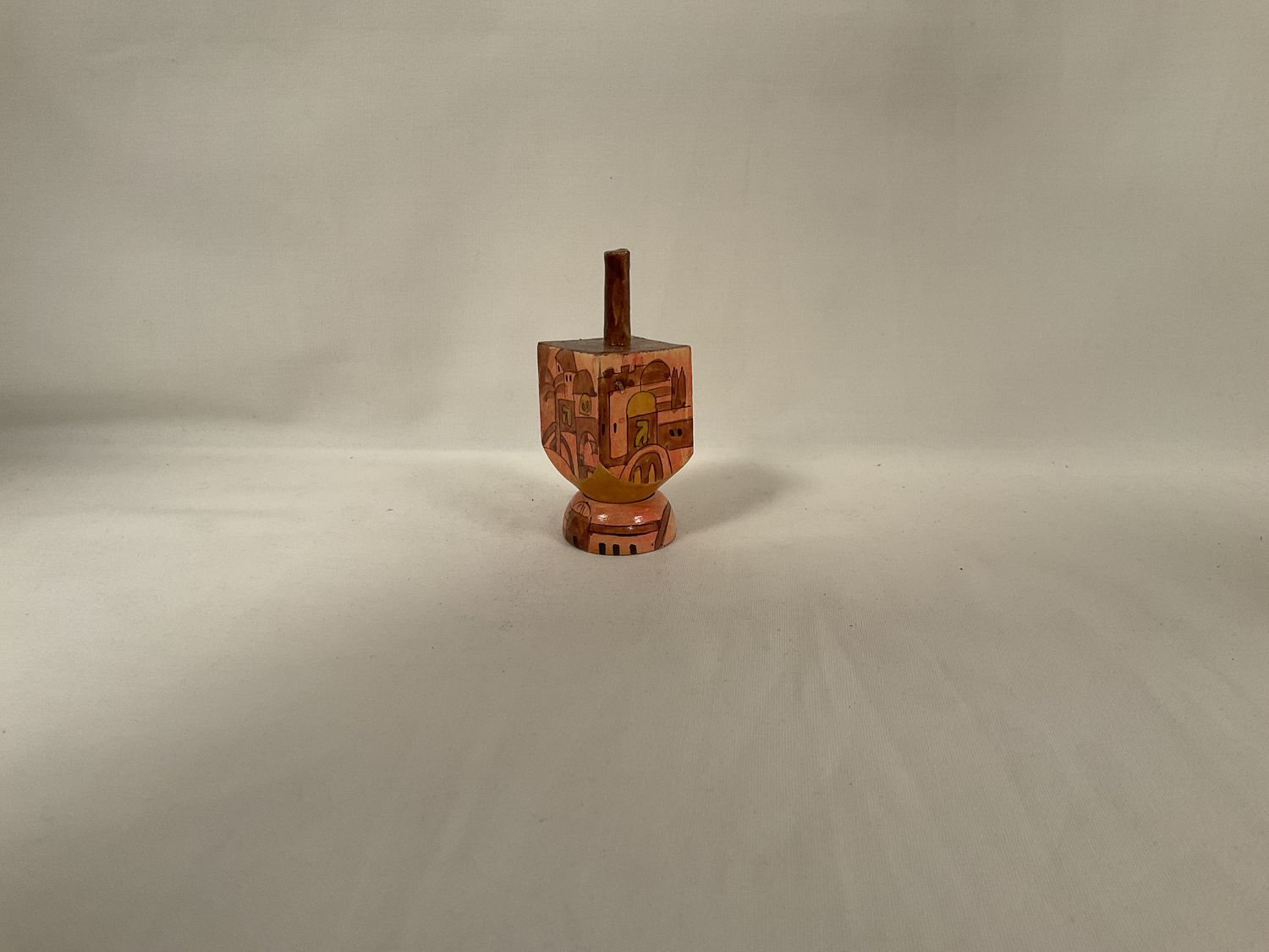 Shades of Brown Painted Dreidel with Jerusalem Scene and Stand Shades of Brown Painted Dreidel with Jerusalem Scene and Stand