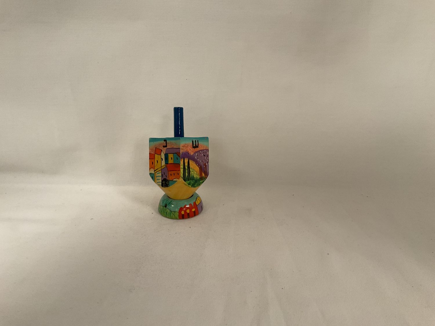 Scenes of Isreal Painted Wood Dreidel on Stand Scenes of Isreal Painted Wood Dreidel on Stand