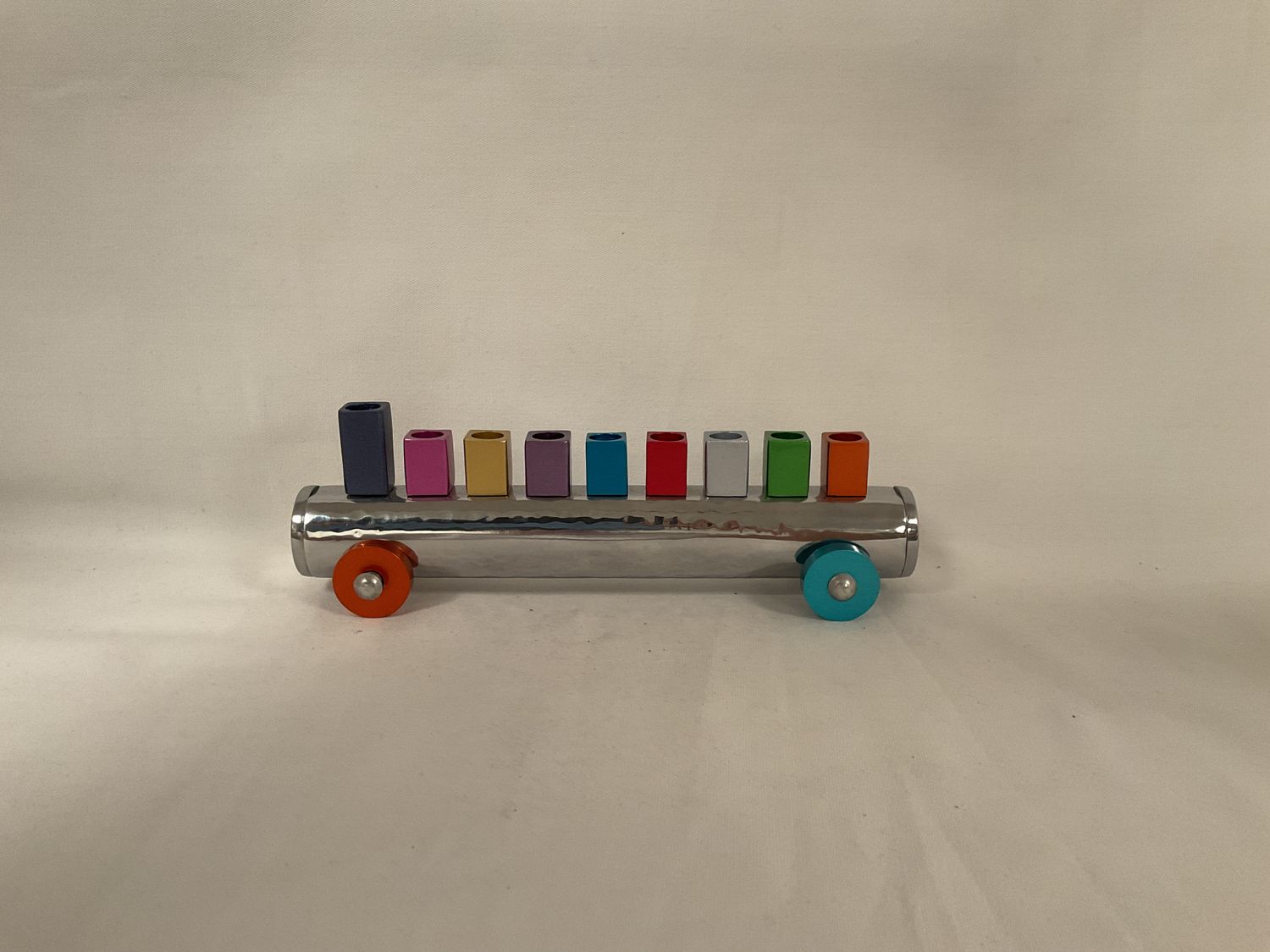 Multicolor Hammered Train Menorah on Wheels Multicolor Hammered Train Menorah on Wheels