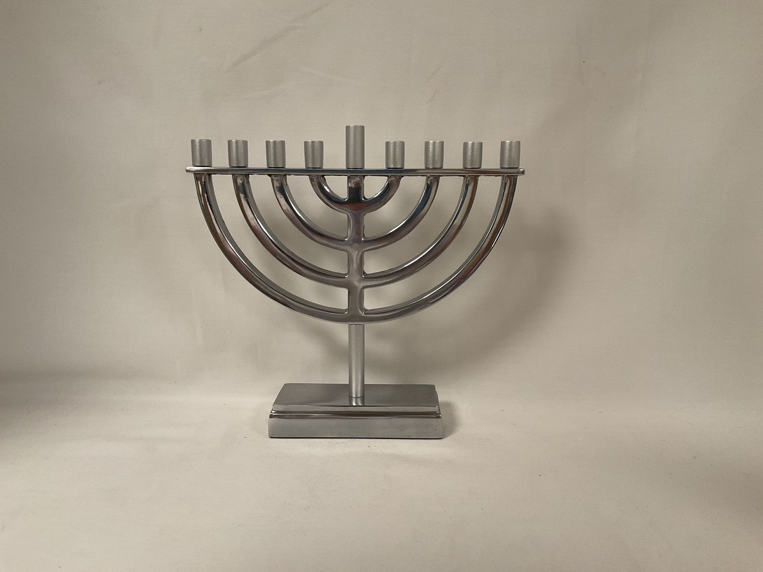 Silver Tone Classic Menorah on Rectangular Base Silver Tone Classic Menorah on Rectangular Base