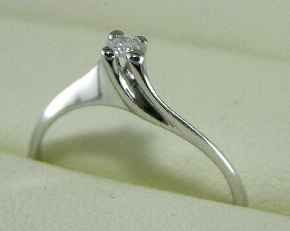 Anello solitario in oro bianco 18kt. con diamante da ct. 0.03 naturale garanzia