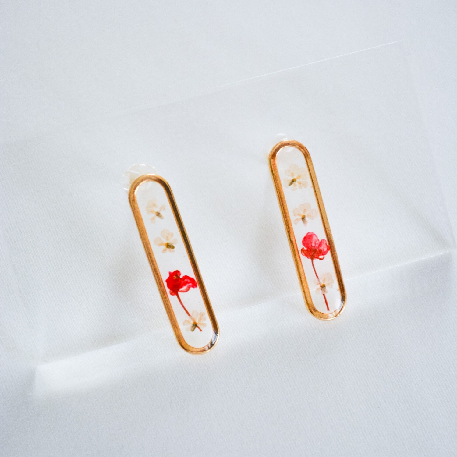 Red & white stud earrings