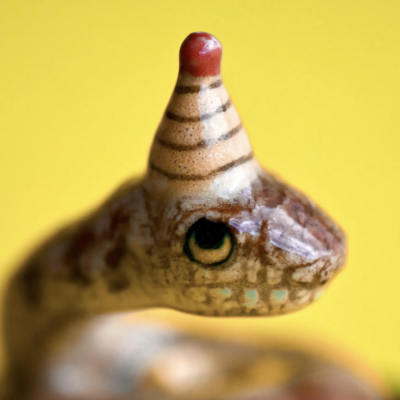 Porcelain Snake "Party Animal" Cake Topper