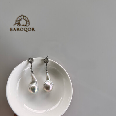 'Age together' white baroque pearl earrings 23x13mm